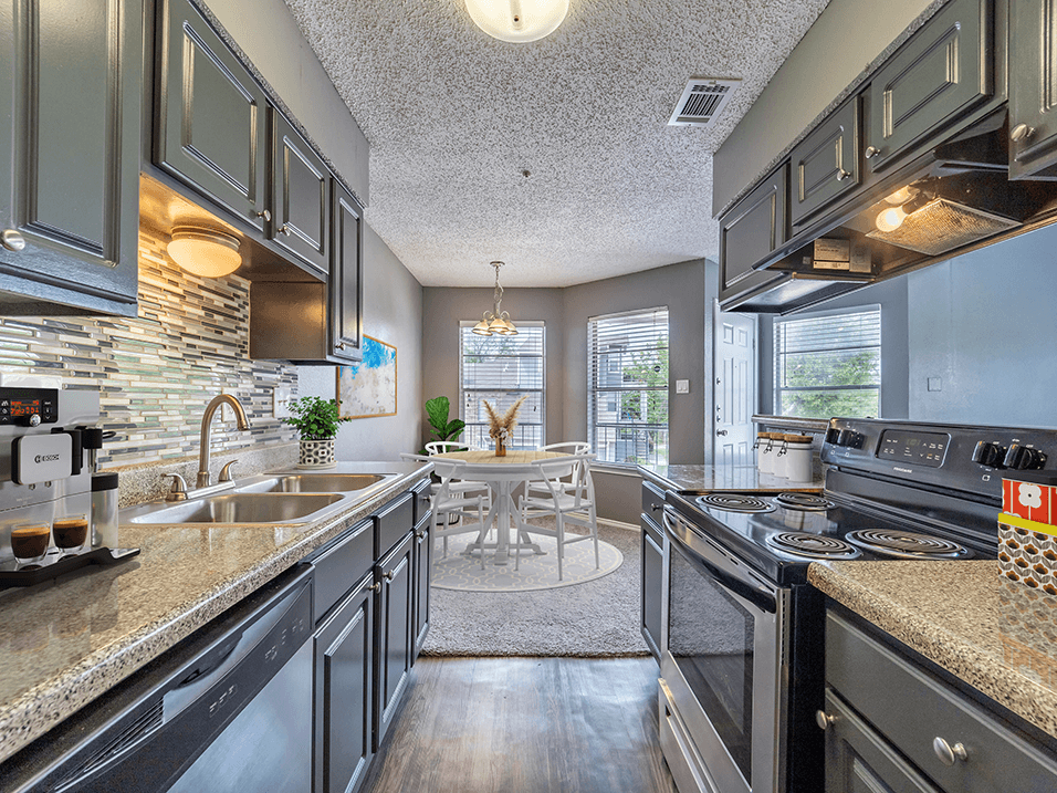 kitchen with updated appliances at summit on the lake apartments