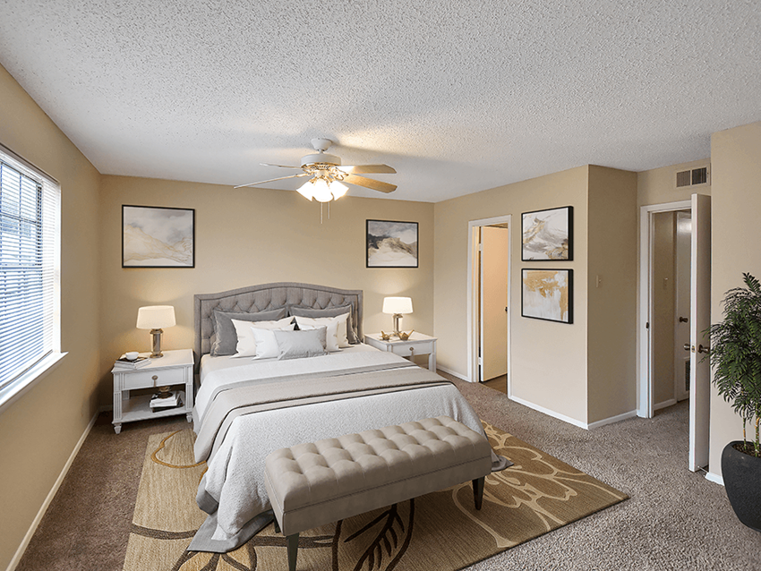 primary bedroom with a ceiling fan - Photo Gallery