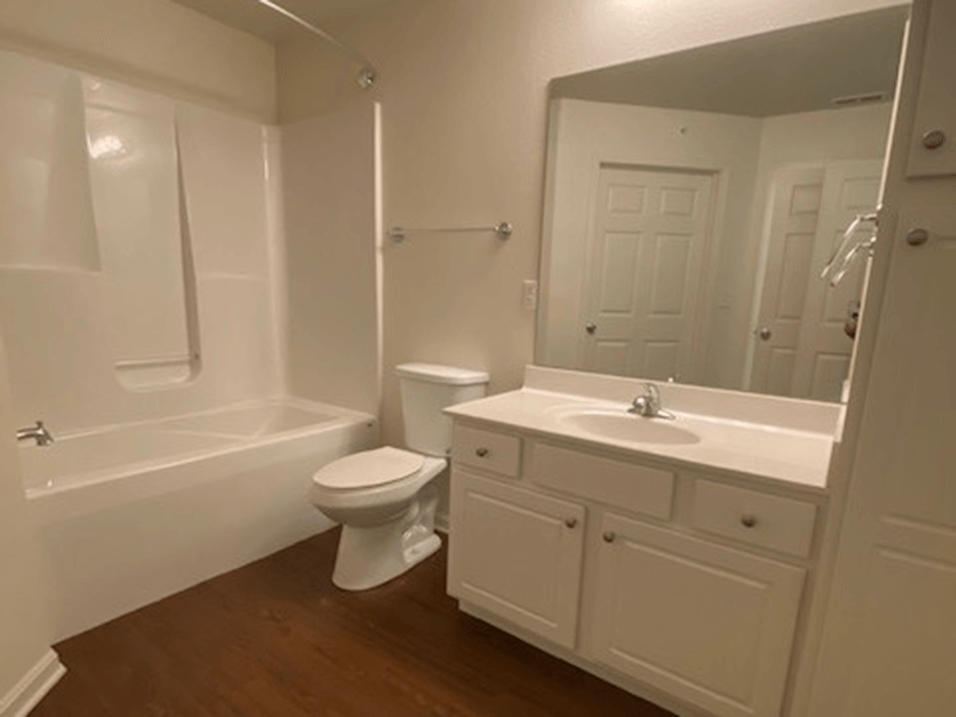 Large Bathroom with tub and vanity space at brickyard apartments