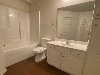 Large Bathroom with tub and vanity space at brickyard apartments - Photo Gallery 9