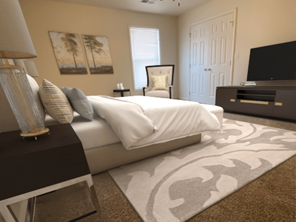 large bedroom with window at brickyard apartments