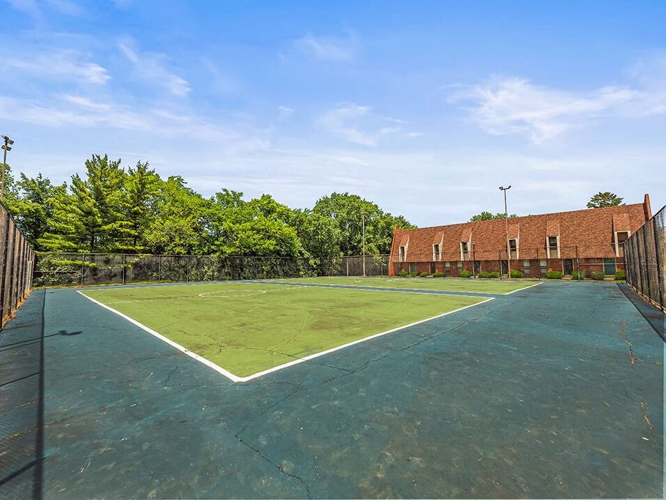 tennis court at apartment community