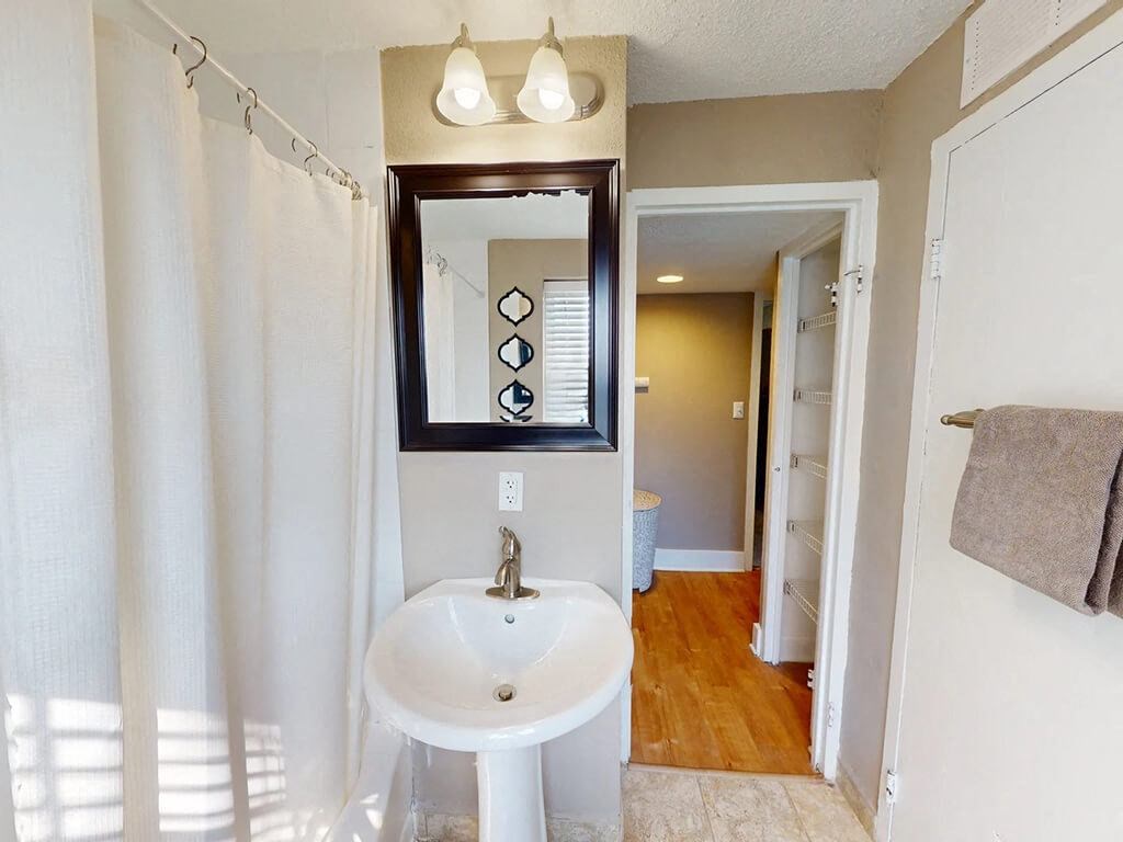 apartment bathroom with tub