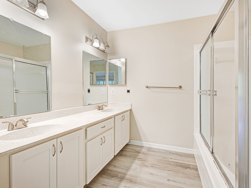 Bathroom with double sink and lots of storage space