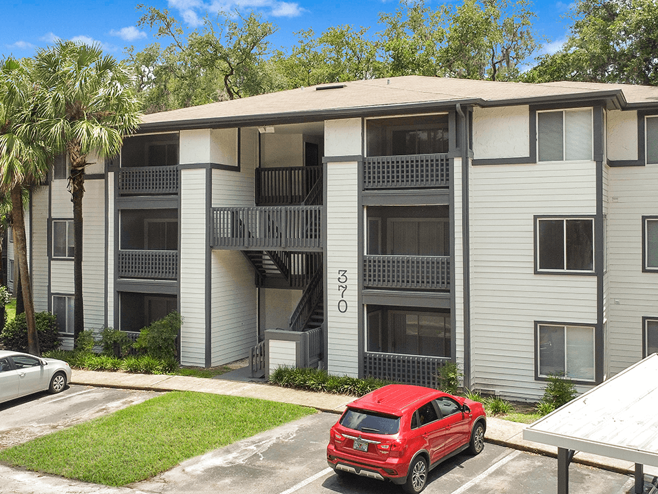 Outdoor view of building at the earl apartments with off street parking