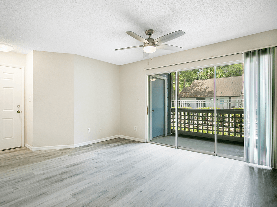 living area that opens onto balcony