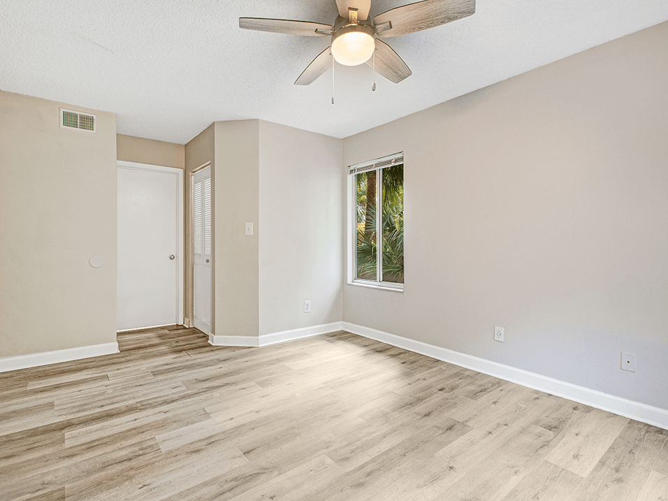 Living Room with hardwood flooring and ceiling fan