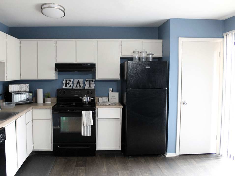 apartment kitchen with cabinets
