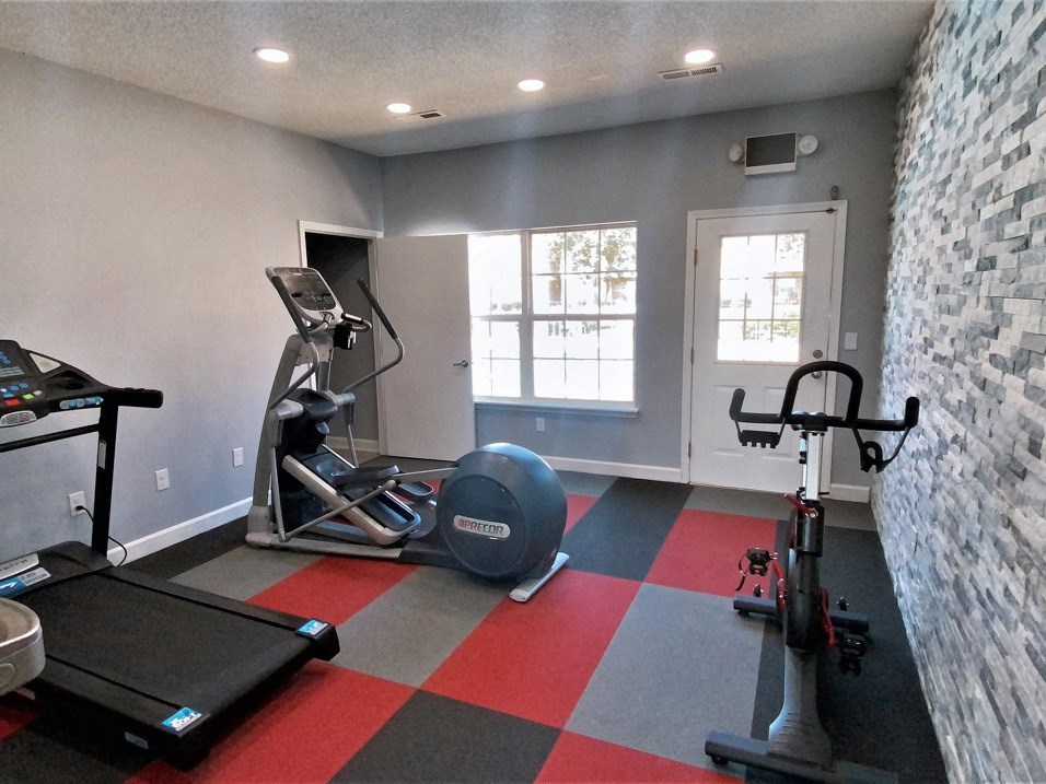 apartment community gym at the landing apartments