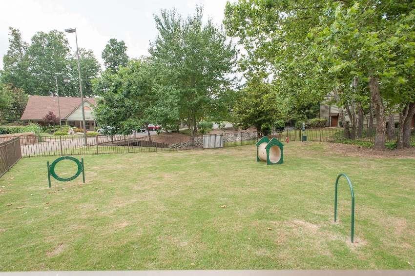 Dog park at Woods of Post House Apartments in Jackson, TN