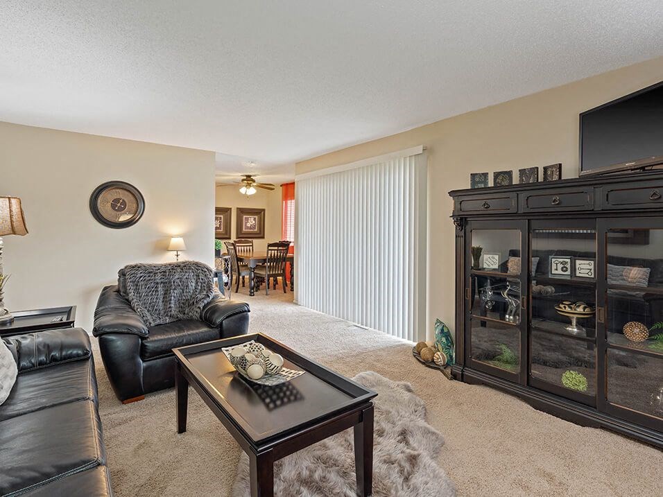 a living room with a couch and a table