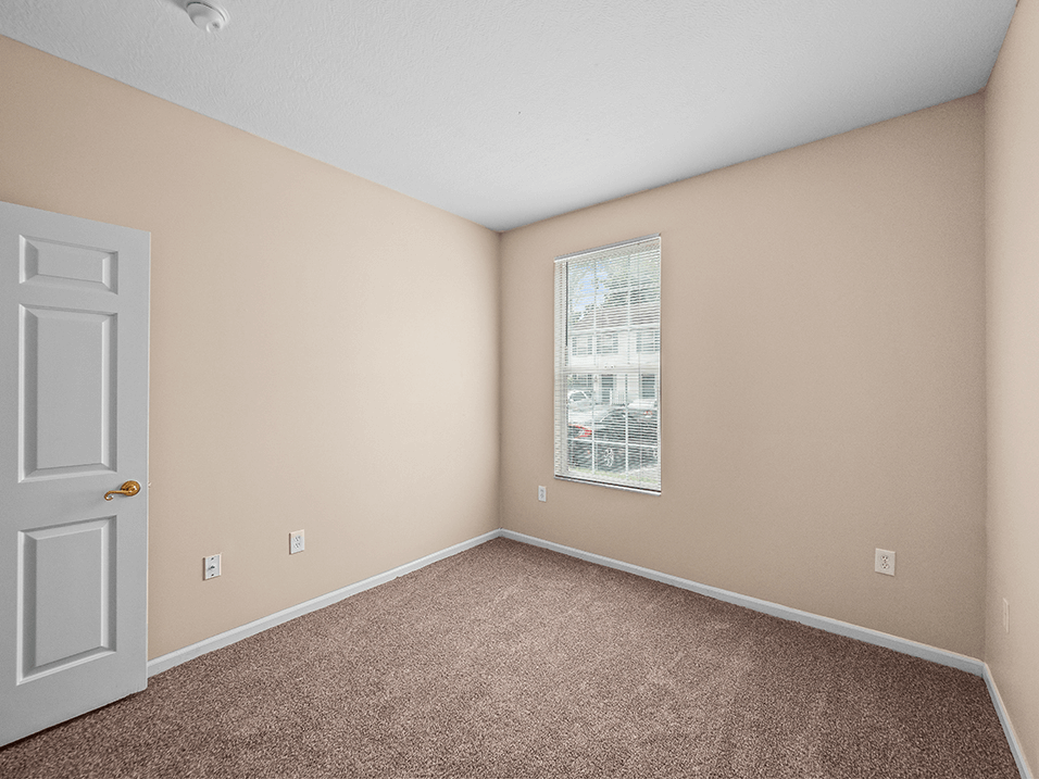 Carpeted Apartment Bedroom