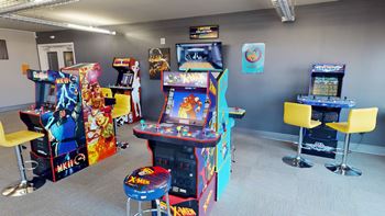 a room filled with arcade games and video games
