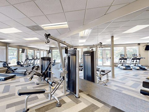 apartment gym with weights and other exercise equipment
