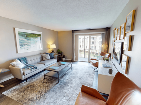 a living room with a couch and a table