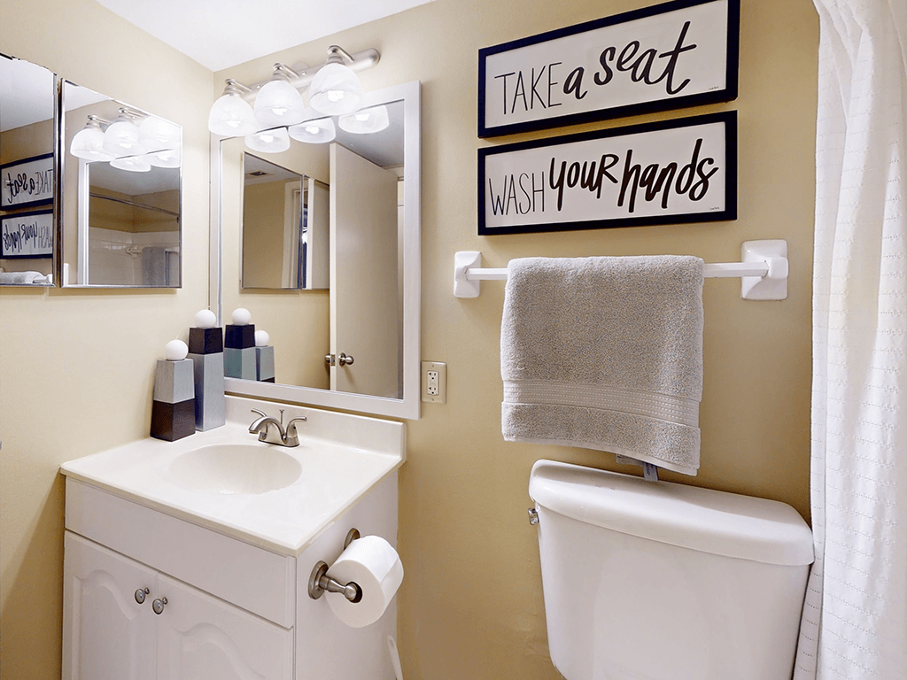 bathroom with a toilet and sink