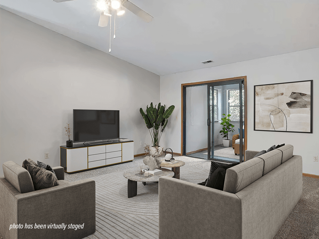 Apartment living room with a door to patio