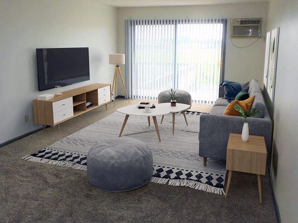Living room at west broadway apartment with large sliding glass doors