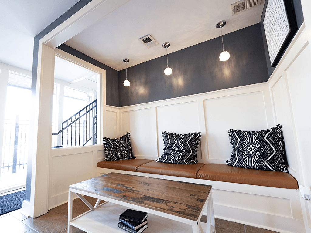 a living room with two couches and a coffee table