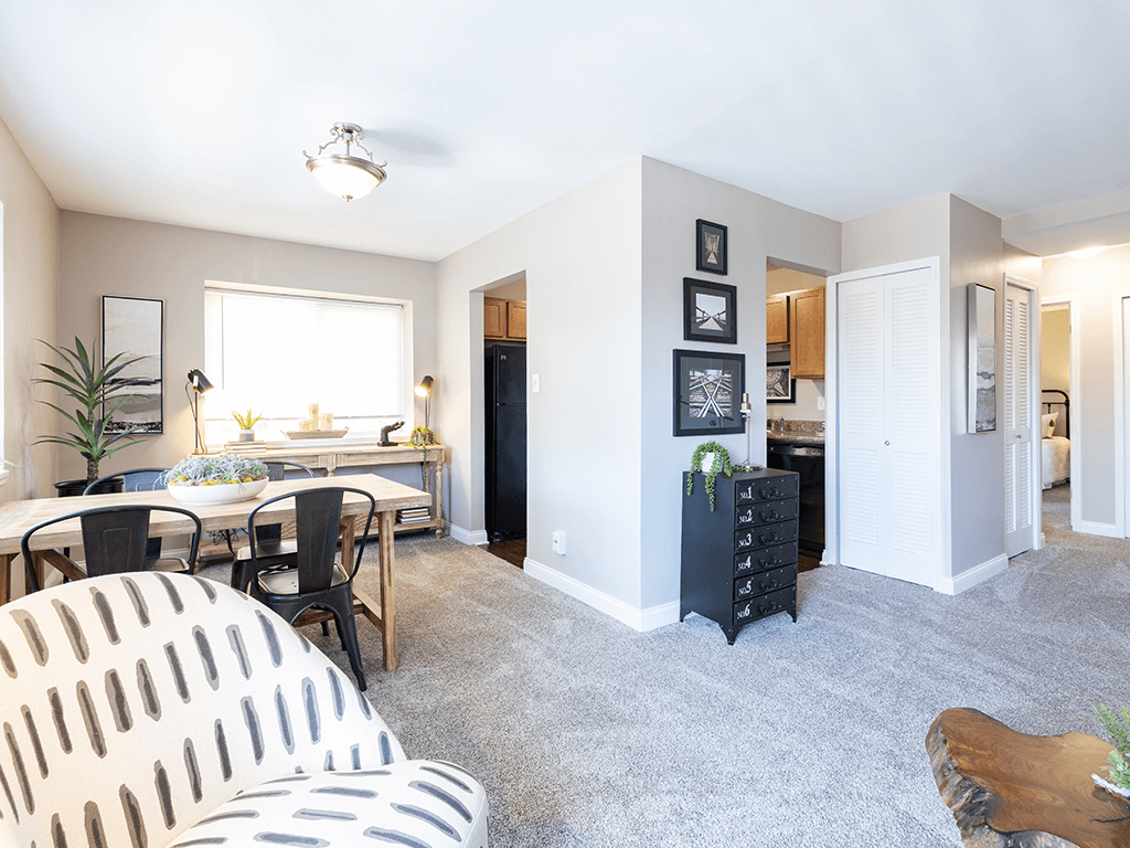 a living room with a dining room and a kitchen