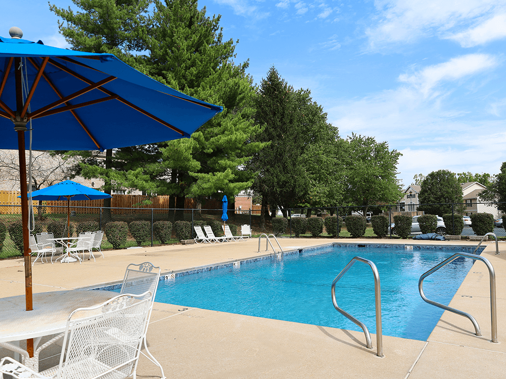 outdoor swimming pool at apartment complex