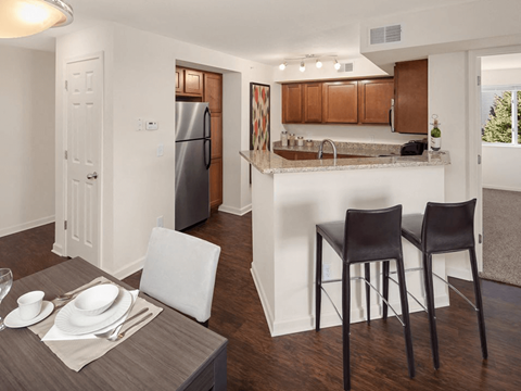 kitchen and dining area at in apartment in spring lake