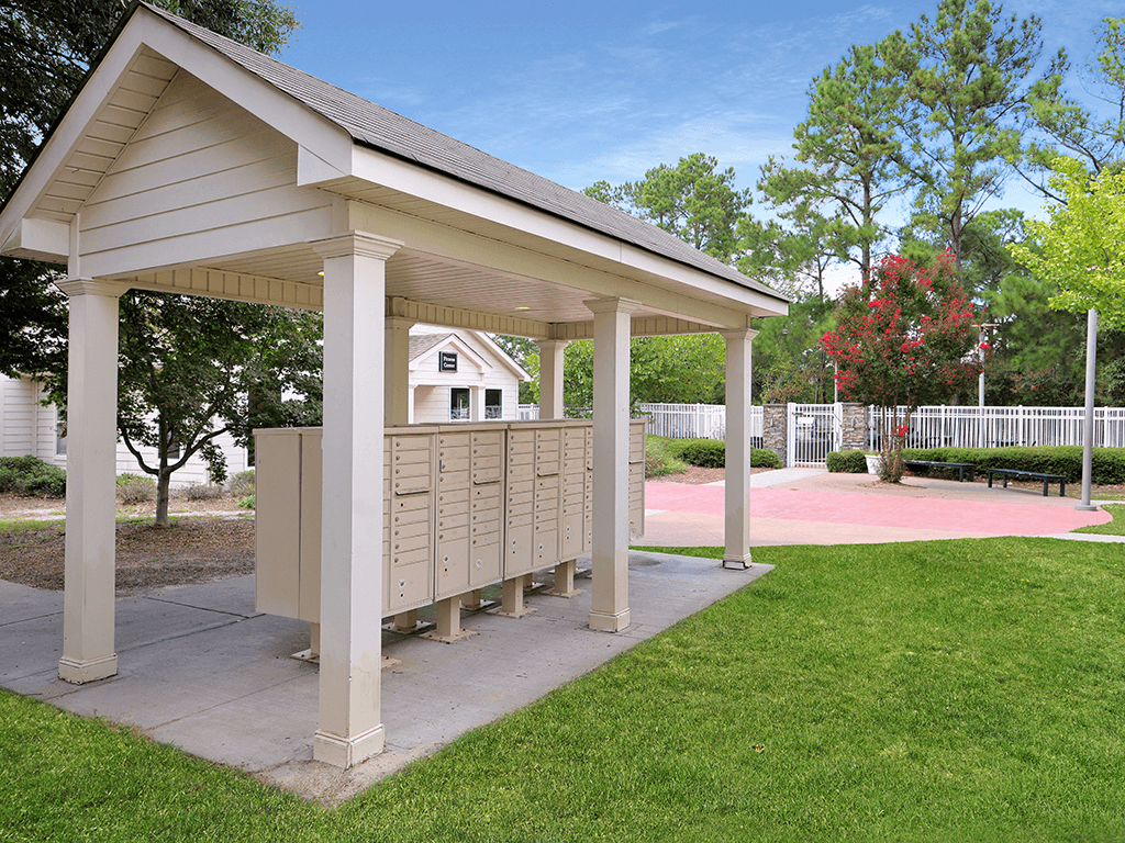 a gazebo with a mail box area