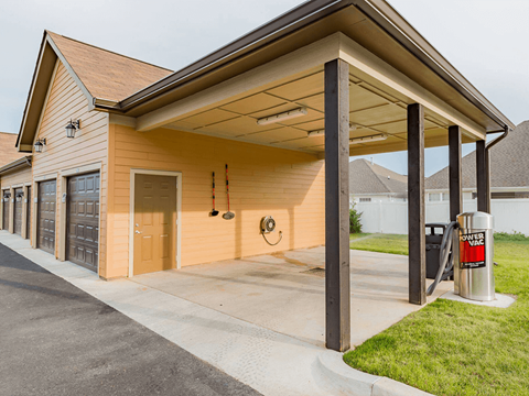 A garage with a carport attached to it.