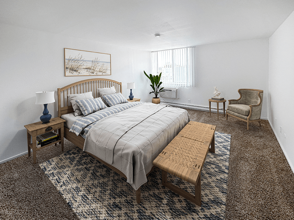 a bedroom with a bed and a chair