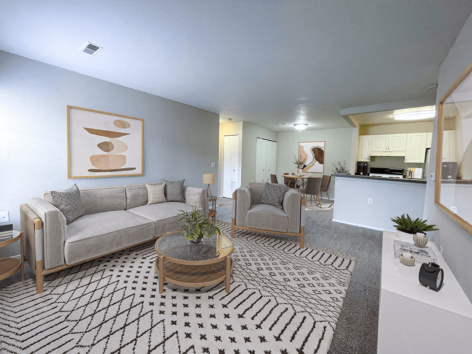 a living room with a couch and two chairs