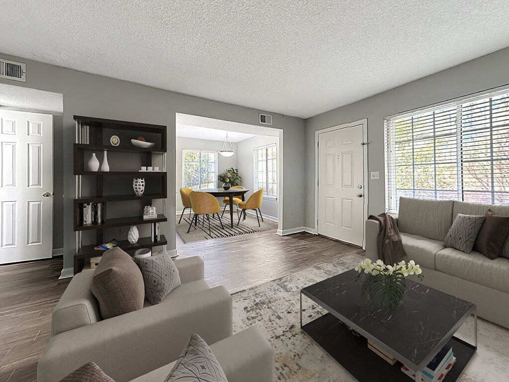 a living room with a couch and a table