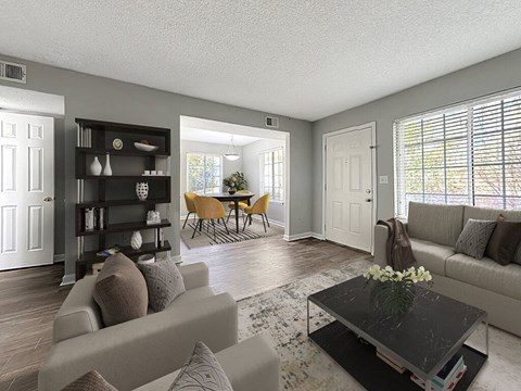 a living room with a couch and a table