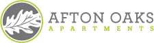 A logo with a leaf design and the text "Afton Oaks Apartment".