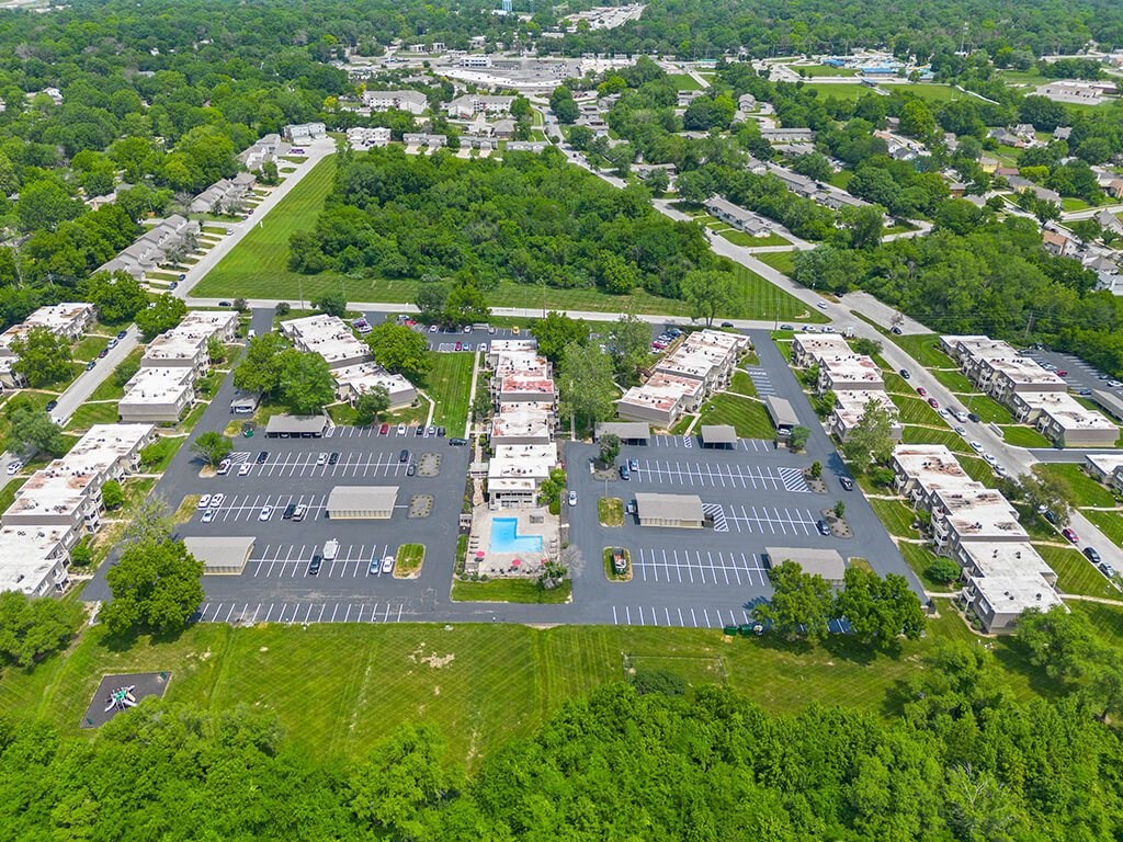 aerial view of a apartment community and trees