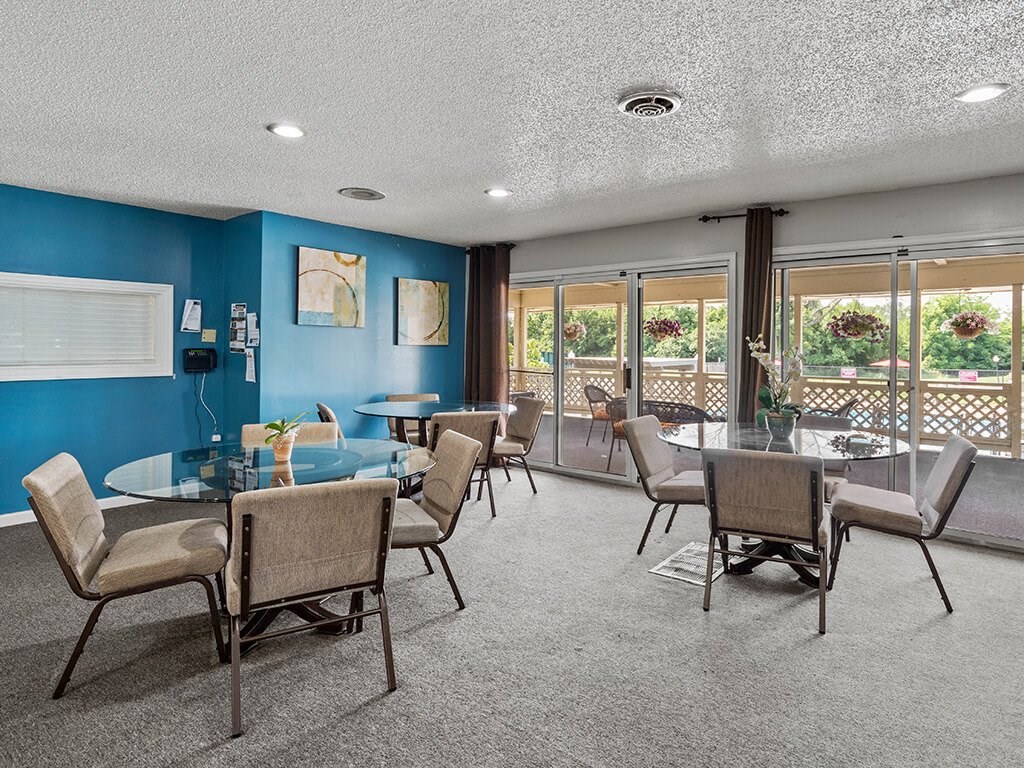 clubhouse with tables and chairs