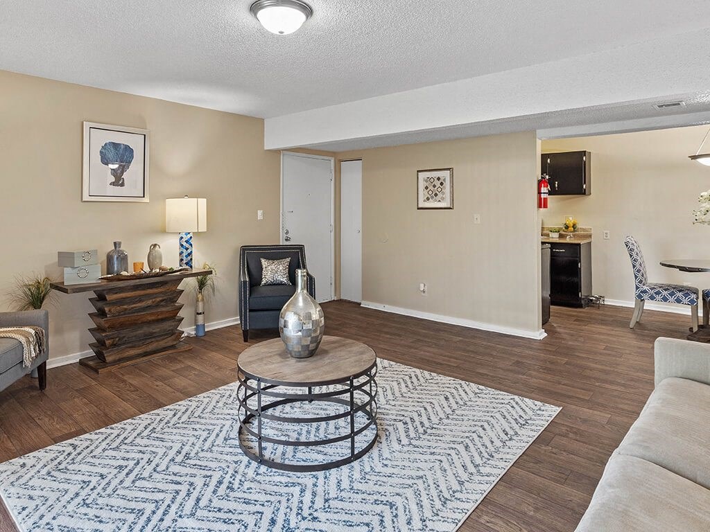 a living room with a couch and a table