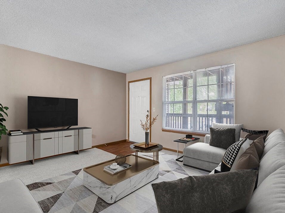 a living room with a couch and a coffee table