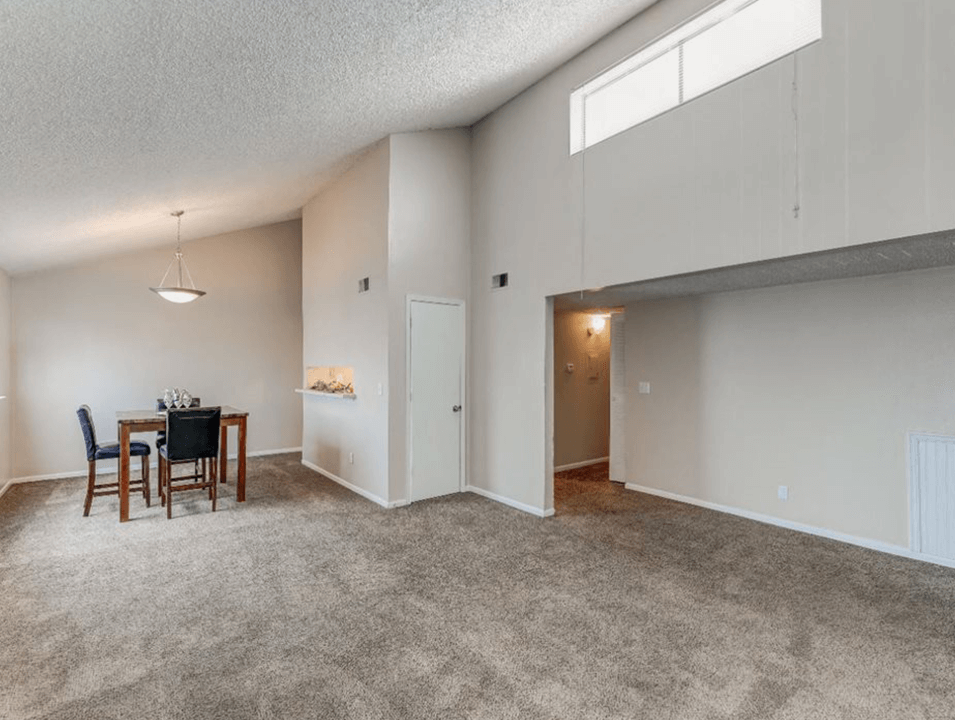 apartment with vaulted ceiling
