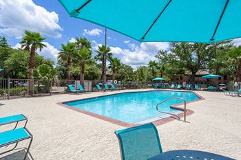 report style pool at acadian point apartments
