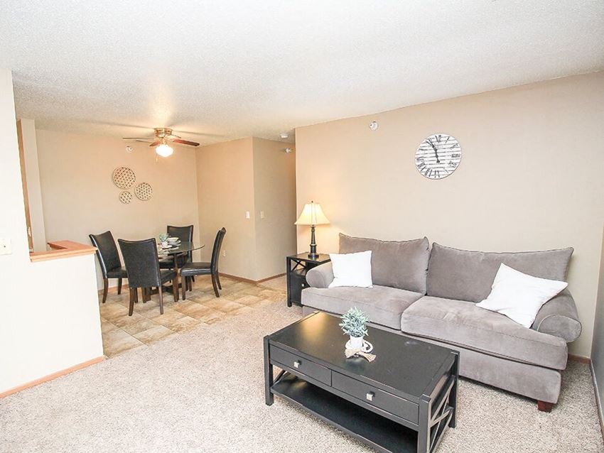 a living room with a couch and a table