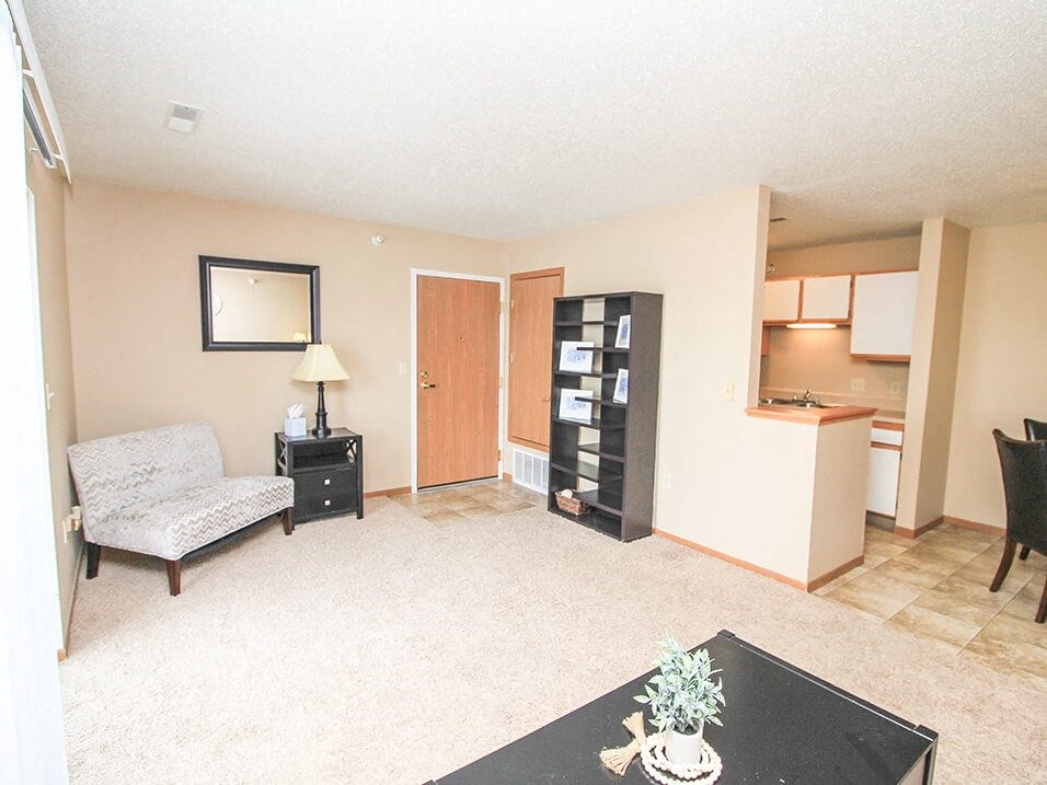 a living room with a couch and a coffee table
