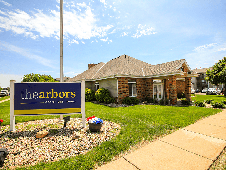a house with a sign in front of it