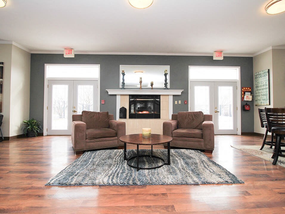 a living room with two couches and a coffee table