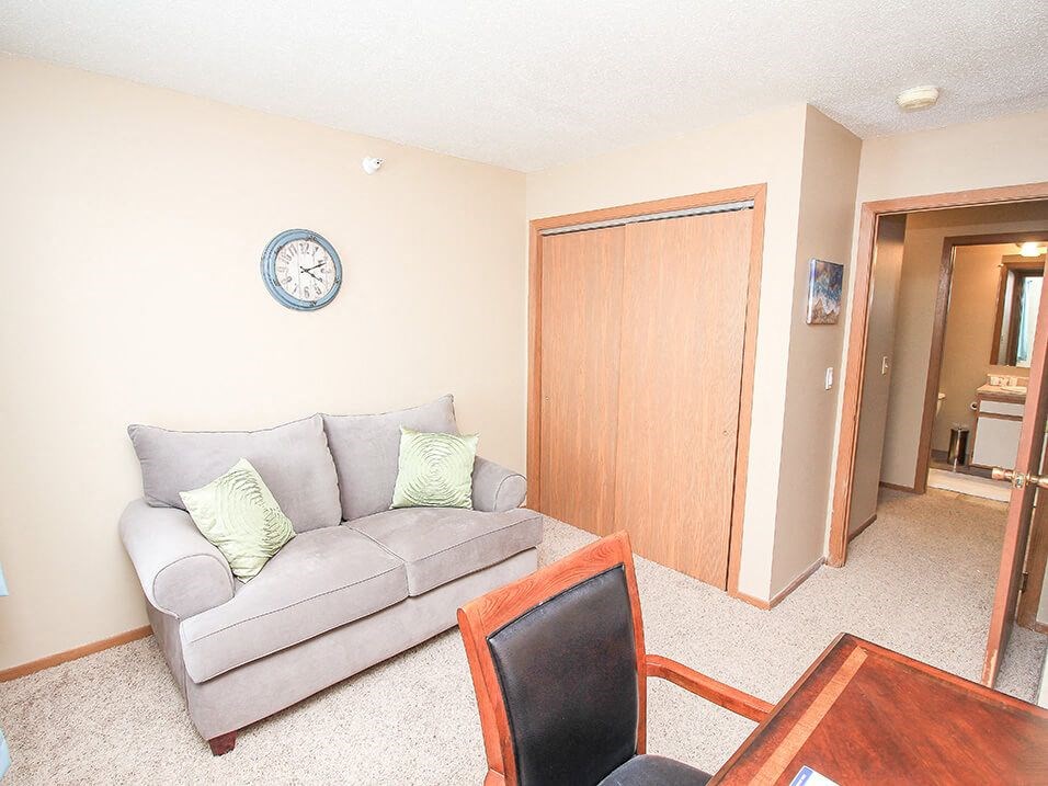 a living room with a couch and a table