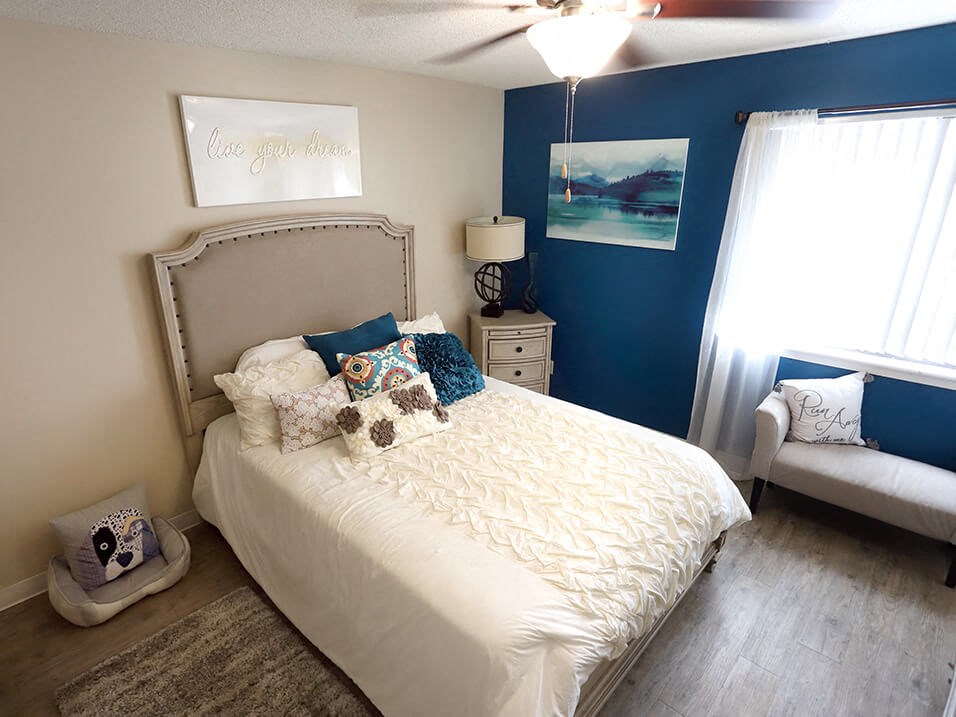 bedroom with overhead light and a window