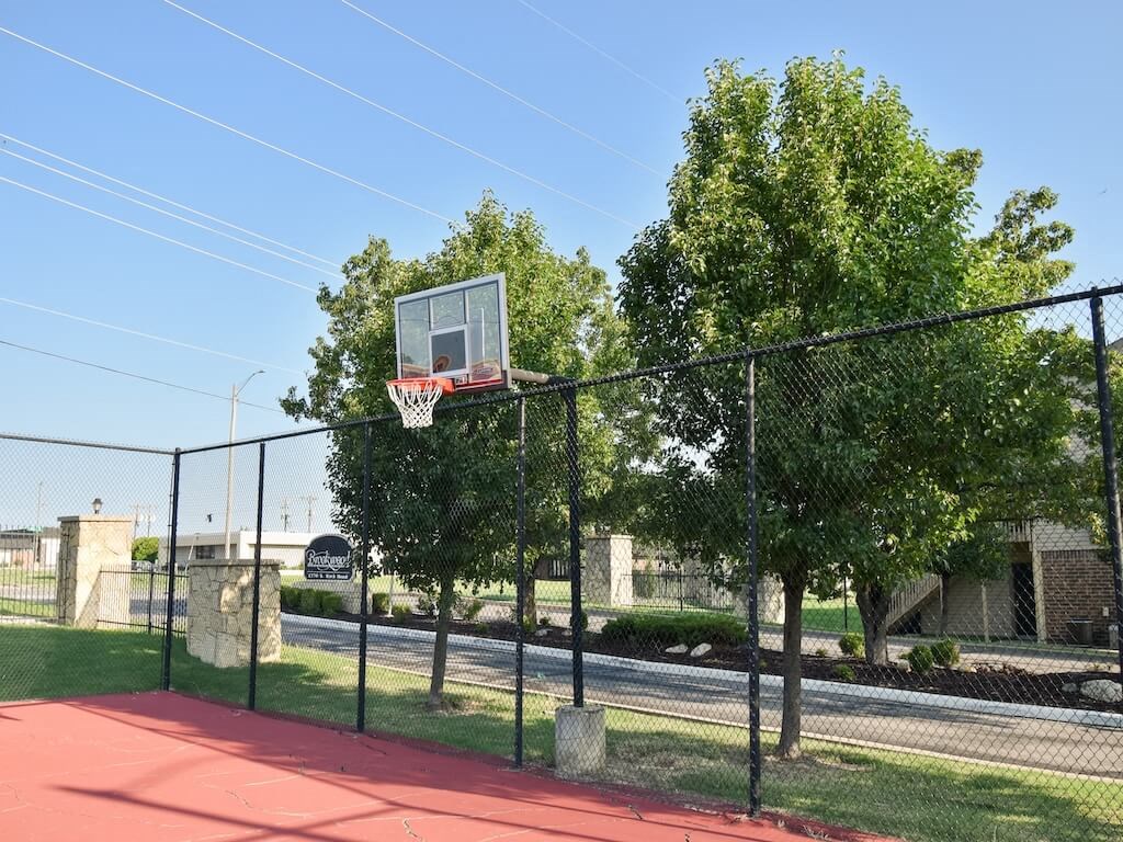Fenced in Basketball court at brookwood apartments