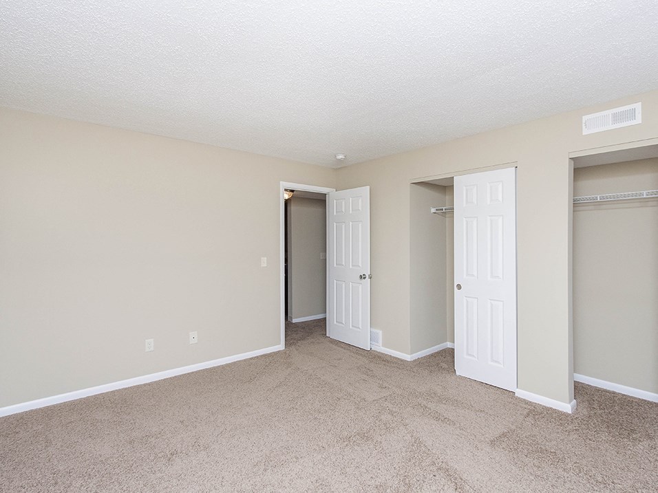 Large primary bedroom with closet space
