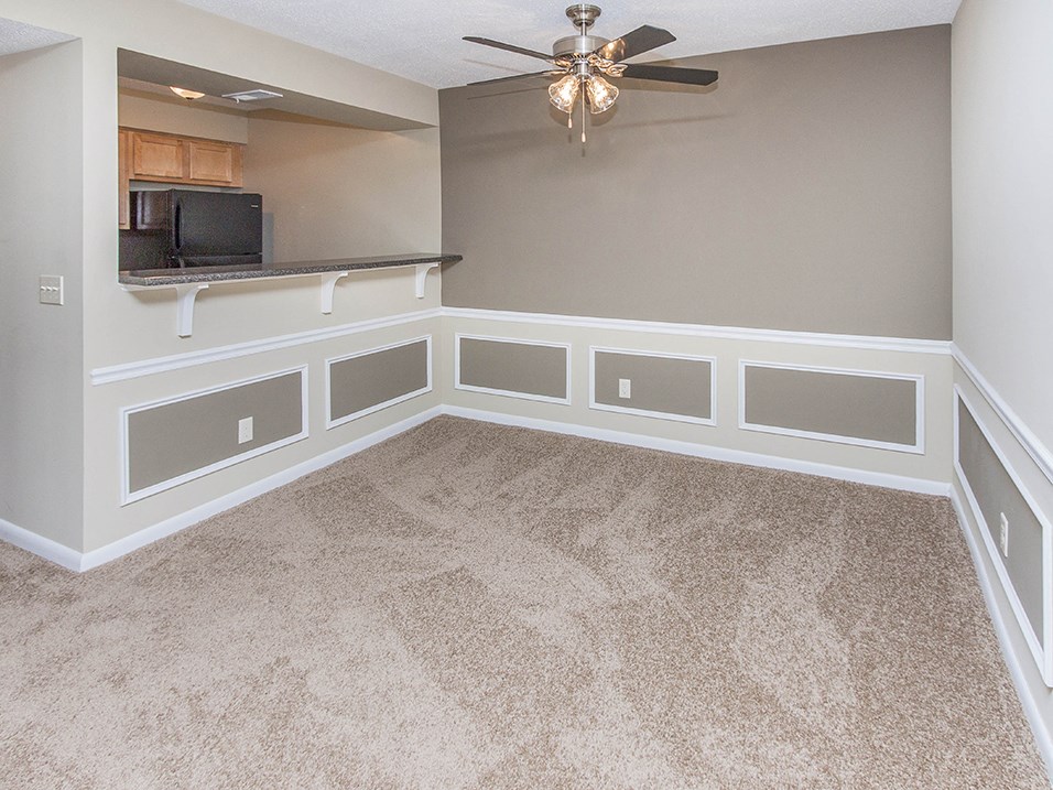 Dining Room Area with Fan and Overhead Light