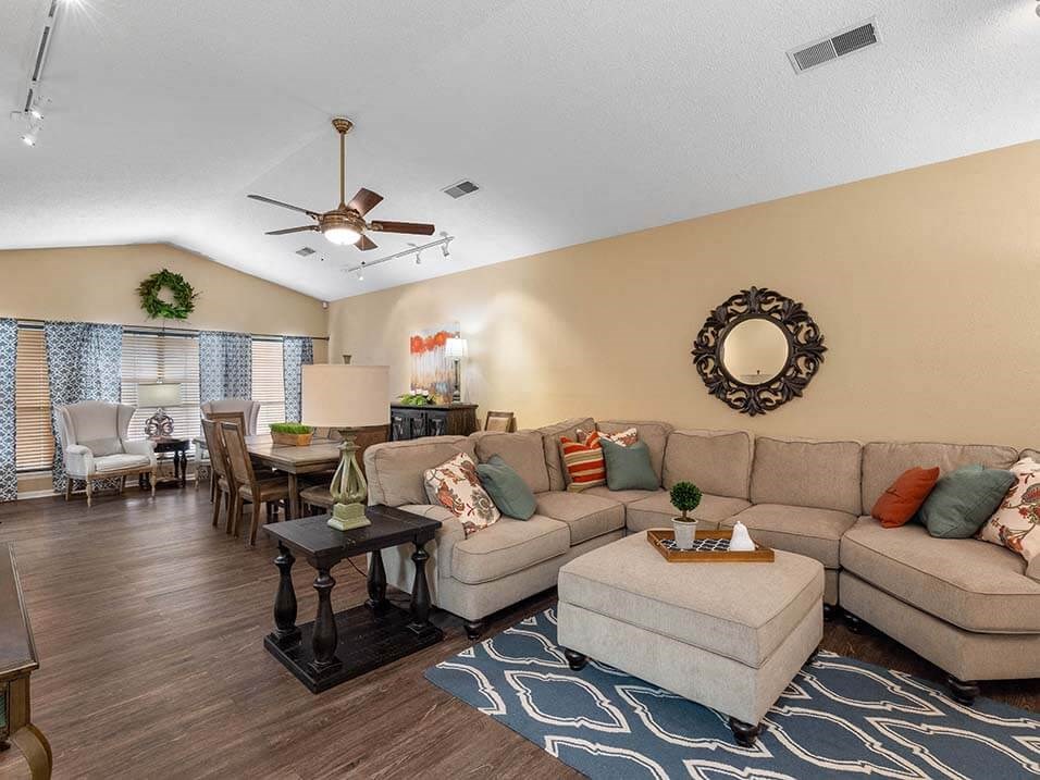 a living room with a couch and a table
