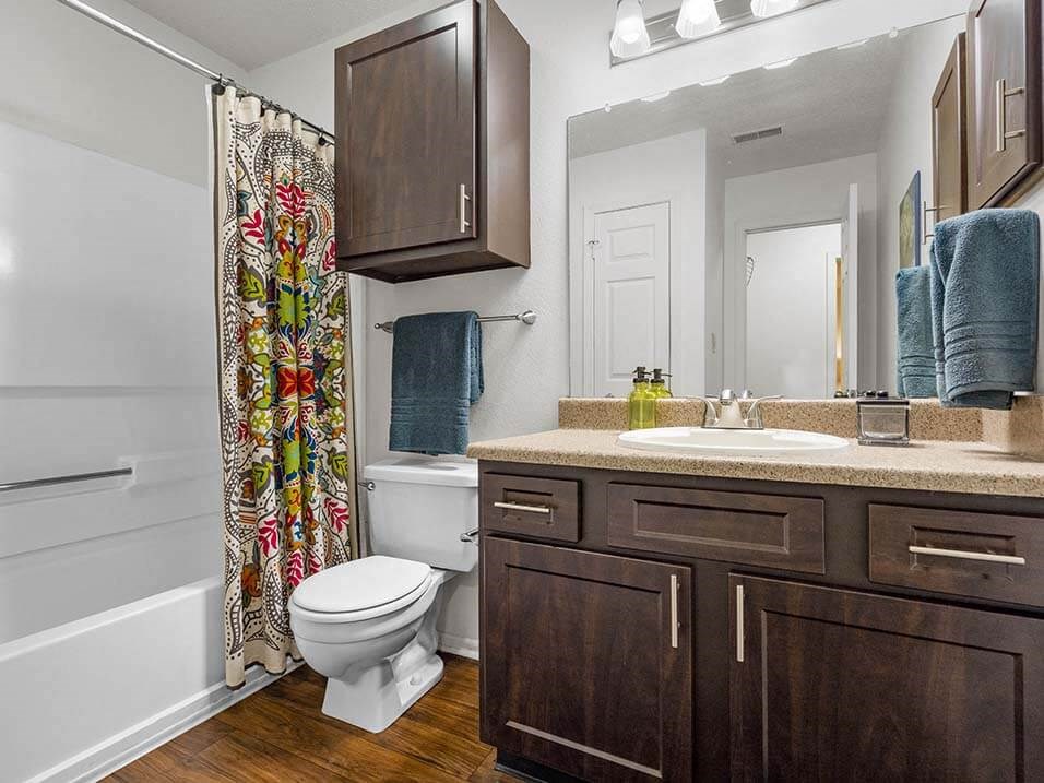 a bathroom with a toilet and a sink